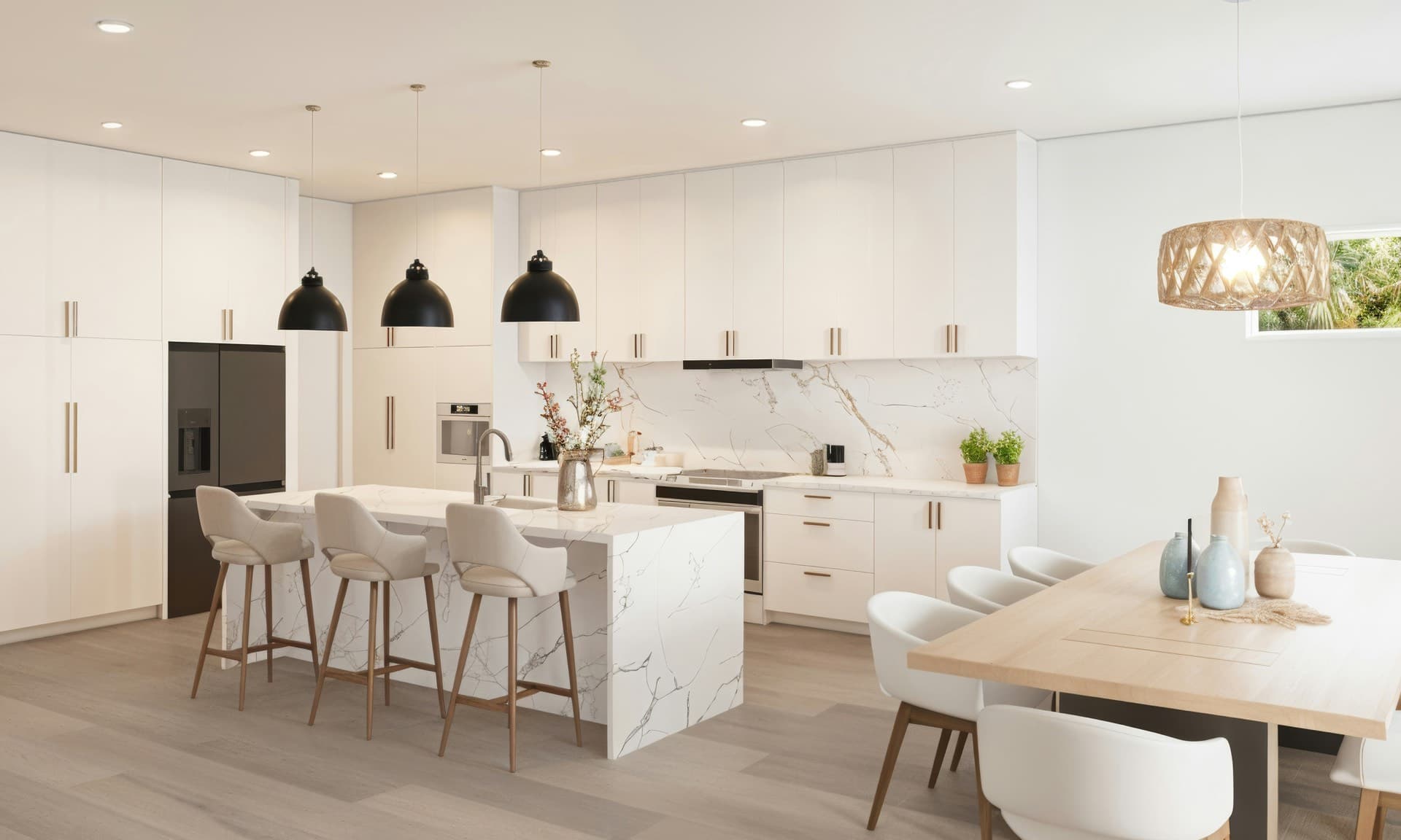 Modern luxury kitchen with marble island and open dining area in a New Smyrna Beach residence