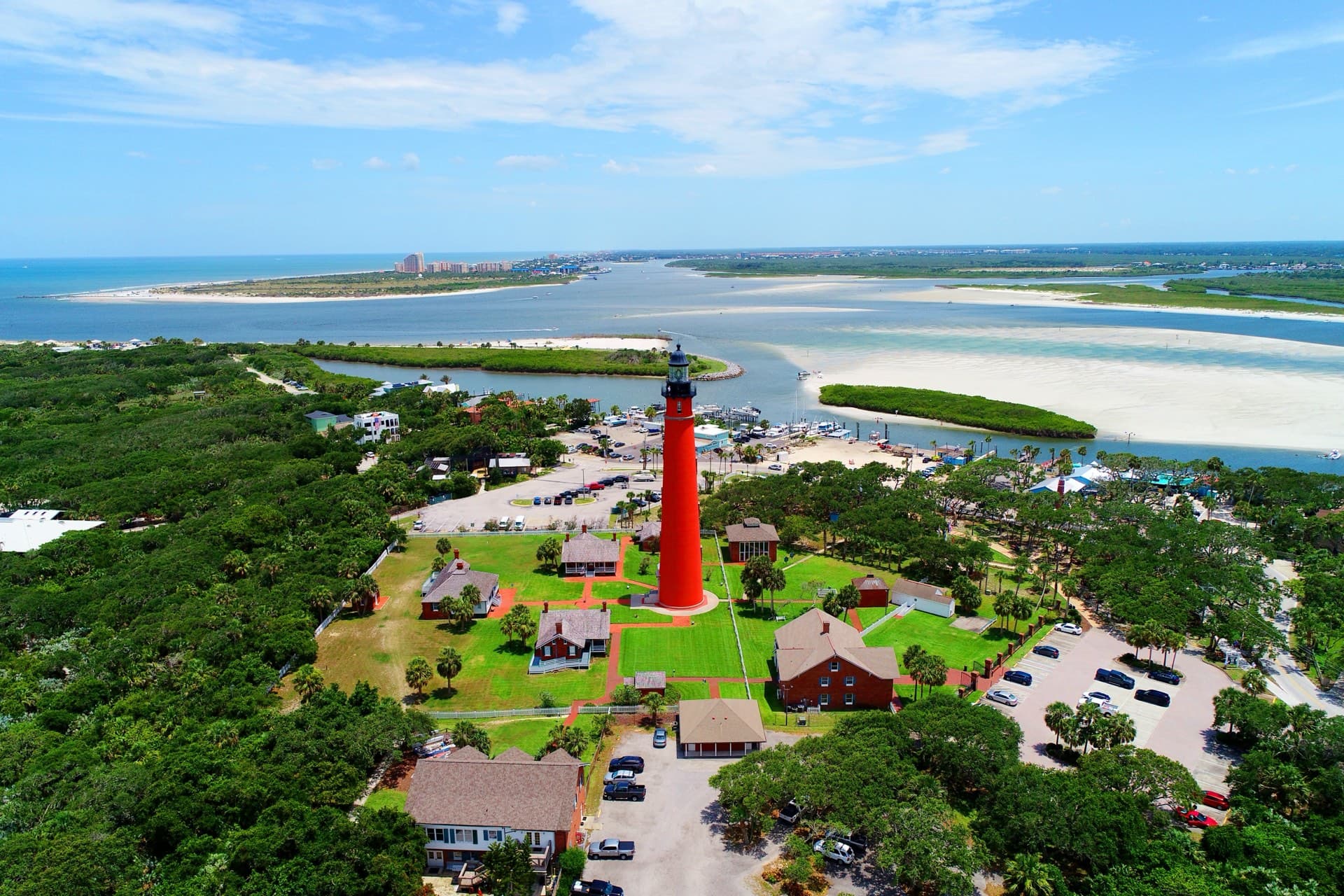Aerial view of Ponce Inlet coastline and barrier island homes in New Smyrna Beach